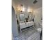 Updated bathroom with double vanity, stylish tile, and large shower at 2649 N Granite Reef Rd, Scottsdale, AZ 85257