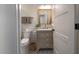 Small bathroom with toilet and vanity at 2649 N Granite Reef Rd, Scottsdale, AZ 85257