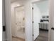 View of bedroom and bathroom with patterned floor at 2649 N Granite Reef Rd, Scottsdale, AZ 85257