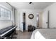 Bedroom with built-in closet and a keyboard on the floor at 2649 N Granite Reef Rd, Scottsdale, AZ 85257