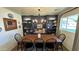 Elegant dining room with built-in shelving and a charming window seat at 2649 N Granite Reef Rd, Scottsdale, AZ 85257