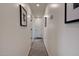 Bright hallway with a runner rug leads to other rooms in the house at 2649 N Granite Reef Rd, Scottsdale, AZ 85257