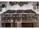 Stainless steel range, pot filler, and white shaker cabinets highlight this kitchen at 2649 N Granite Reef Rd, Scottsdale, AZ 85257