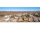 Aerial view of neighborhood with mountain range in background at 26538 N 132Nd Ln, Peoria, AZ 85383