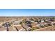 Aerial view of neighborhood with mountain range in background at 26538 N 132Nd Ln, Peoria, AZ 85383