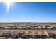 Aerial view of houses with mountain range in background at 26538 N 132Nd Ln, Peoria, AZ 85383