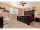 Large bedroom with a king-size bed and neutral decor at 26538 N 132Nd Ln, Peoria, AZ 85383