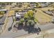 Aerial view showcasing a house with a pool and a large yard at 2889 E Tremaine Ave, Gilbert, AZ 85234