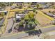 Aerial view of a house with a circular driveway and pool at 2889 E Tremaine Ave, Gilbert, AZ 85234