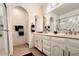 Bright bathroom with double vanity, and updated fixtures at 2889 E Tremaine Ave, Gilbert, AZ 85234