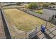 Large empty lot with chain link fence and concrete blocks at 2889 E Tremaine Ave, Gilbert, AZ 85234