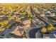 An aerial view of a house nestled in a residential neighborhood, showcasing the property and surroundings at 2921 S Martingale Rd, Gilbert, AZ 85295