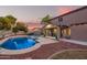 Spacious backyard with a refreshing pool and string lights at 2921 S Martingale Rd, Gilbert, AZ 85295