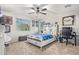 Baseball-themed bedroom with a full-size bed and workspace at 2921 S Martingale Rd, Gilbert, AZ 85295