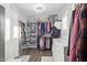 Large walk-in closet with ample shelving and drawers at 2921 S Martingale Rd, Gilbert, AZ 85295