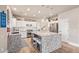 Updated kitchen featuring white cabinets, granite countertops, and stainless steel appliances at 2921 S Martingale Rd, Gilbert, AZ 85295