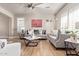 Spacious living room featuring hardwood floors, comfortable seating, and stylish decor at 2921 S Martingale Rd, Gilbert, AZ 85295