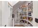 Well-organized pantry with ample shelving for storage at 2921 S Martingale Rd, Gilbert, AZ 85295