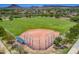 Aerial view of a community baseball field with seating at 30034 N 128Th Ave, Peoria, AZ 85383