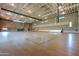 Indoor basketball court with bleachers at 30034 N 128Th Ave, Peoria, AZ 85383