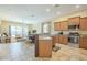 Modern kitchen with granite countertops and stainless steel appliances at 30034 N 128Th Ave, Peoria, AZ 85383