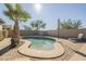 Charming kidney shaped pool with a pavered deck and lush landscaping at 30034 N 128Th Ave, Peoria, AZ 85383