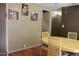 Simple dining area with a table and chairs next to the kitchen at 303 S Recker Rd # 9, Mesa, AZ 85206