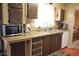 Clean kitchen featuring updated countertops and cabinets at 303 S Recker Rd # 9, Mesa, AZ 85206