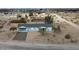 Aerial view of a single-story house with a gravel driveway at 34902 W Caldwell St, Tonopah, AZ 85354