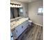 Elegant bathroom with granite countertop and white cabinets at 34902 W Caldwell St, Tonopah, AZ 85354