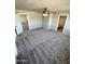 Spacious bedroom with carpeted floors and ensuite bathroom at 34902 W Caldwell St, Tonopah, AZ 85354