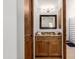 Wood vanity and mirror in a spacious bathroom at 3630 W Bohl St, Laveen, AZ 85339