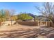 View of the backyard with mountain views and brick-paved patio at 3630 W Bohl St, Laveen, AZ 85339