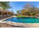 Inviting kidney-shaped pool with flagstone decking at 3630 W Bohl St, Laveen, AZ 85339