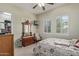 Bedroom with antique dresser and views to a shared bath at 3817 E Cielo Grande Ave, Phoenix, AZ 85050