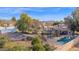 Aerial view of property showcasing pool and chicken coop at 3848 W Morrow Dr, Glendale, AZ 85308