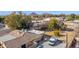 Aerial view showing house, yard, pool, and play area at 3848 W Morrow Dr, Glendale, AZ 85308