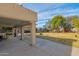 Covered patio with seating area overlooking the backyard at 3848 W Morrow Dr, Glendale, AZ 85308