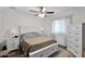 Bedroom with white dresser and queen-size bed at 3848 W Morrow Dr, Glendale, AZ 85308