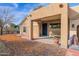 Covered patio with seating area and view of the backyard at 3848 W Morrow Dr, Glendale, AZ 85308