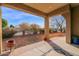 Covered patio with brick flooring and view of backyard at 3848 W Morrow Dr, Glendale, AZ 85308