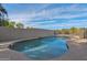 Inviting kidney-shaped swimming pool in a sunny backyard at 3848 W Morrow Dr, Glendale, AZ 85308