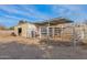 Detached workshop with covered area and corral at 3848 W Morrow Dr, Glendale, AZ 85308