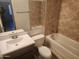 Bathroom with tub, toilet and updated vanity at 3941 E Emile Zola Ave, Phoenix, AZ 85032