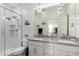 Bright bathroom with subway tile shower and granite countertop with double sinks at 4058 E Erie E St # 103, Gilbert, AZ 85295