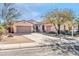 Single-story home with two-car garage and desert landscaping at 4113 E Burnside Trl, Cave Creek, AZ 85331