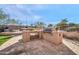 Outdoor kitchen with stainless steel appliances and stone counters at 4113 E Burnside Trl, Cave Creek, AZ 85331