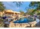 Inviting kidney shaped pool with surrounding patio at 4113 E Burnside Trl, Cave Creek, AZ 85331