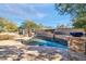 Relaxing kidney shaped pool with stone accents and patio at 4113 E Burnside Trl, Cave Creek, AZ 85331