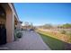 Backyard features a paved patio and artificial turf at 42028 N Crooked Stick Rd, Anthem, AZ 85086